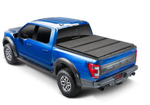 Load image into Gallery viewer, Extang 22-23 Nissan Frontier (6ft. 1in. Bed) Solid Fold ALX