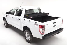 Load image into Gallery viewer, Extang 05-16 Nissan Frontier(5ft Bed) (w/ or w/o Track Sys) (5ft) Solid Fold 2.0