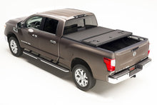 Load image into Gallery viewer, Extang 05-16 Nissan Frontier(5ft Bed) (w/ or w/o Track Sys) (5ft) Solid Fold 2.0